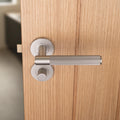 Spitfire REEDED door lever on rose - solid brass
