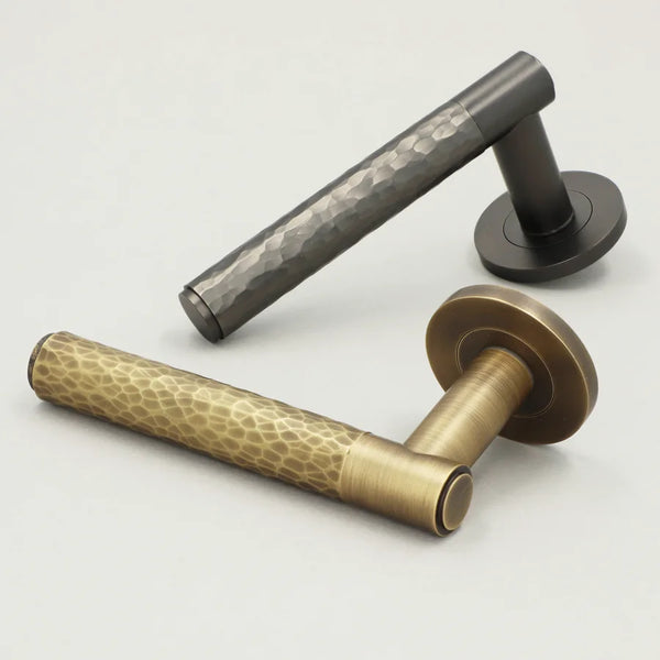 Hammered door lever on rose - solid brass