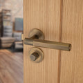 Spitfire HEX door lever on rose - solid brass