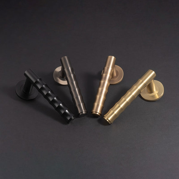 Bamboo door lever on rose - solid brass