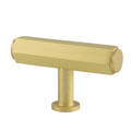 Gold cabinet knob on a white background