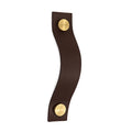 Brown leather pull handle with gold circular accents on a white background