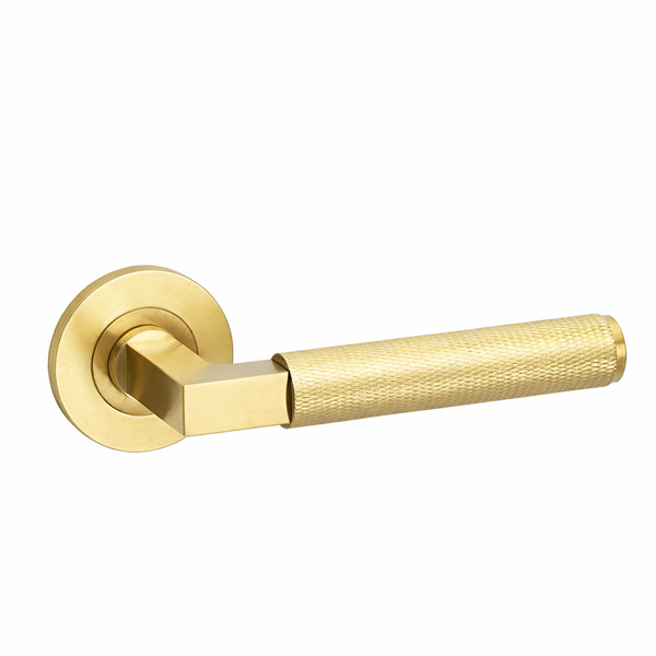 Knurled hurricane lever on rose door handle - brass