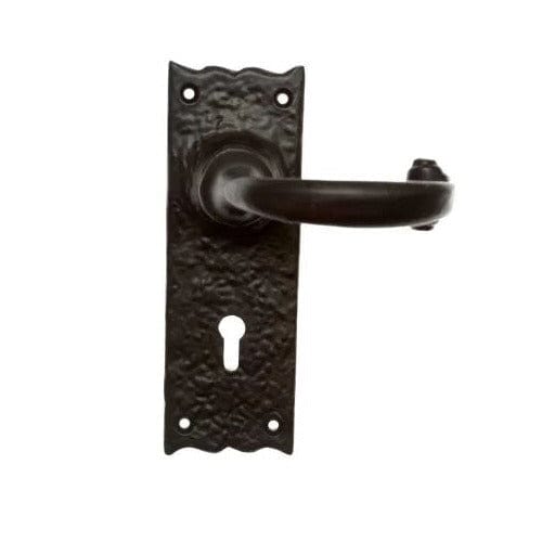 Wrought iron handle on plate keyhole