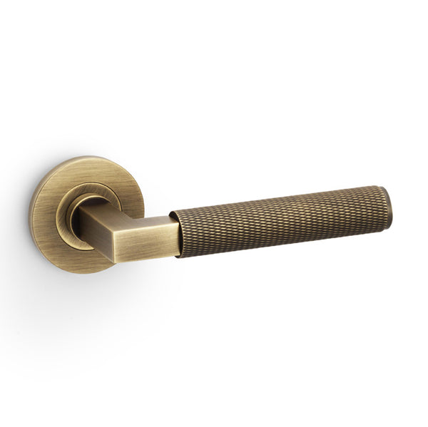 Hurricane KNURLED door lever on rose - solid brass