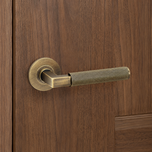 Hurricane REEDED door lever on rose - solid brass