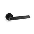 Hammered door lever on rose - solid brass