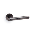 Hammered door lever on rose - solid brass