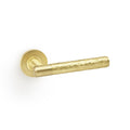 Hammered door lever on rose - solid brass