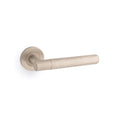Hammered door lever on rose - solid brass