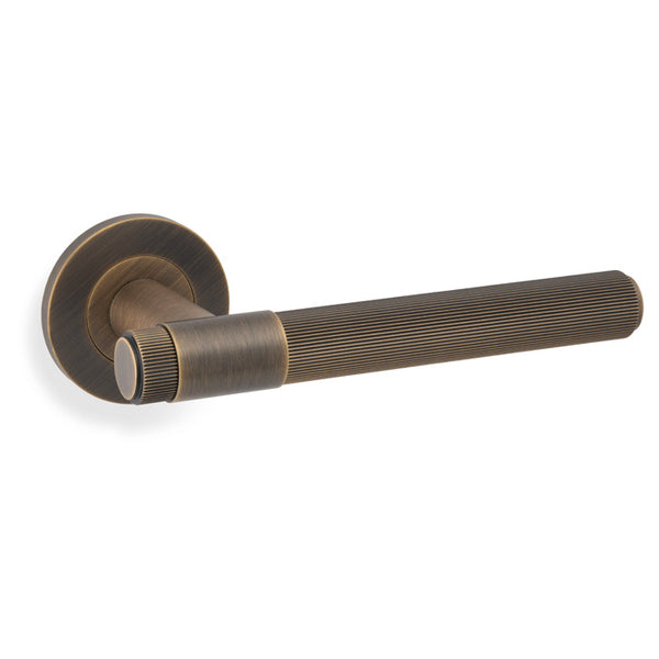 Kingston REEDED door lever on rose - solid brass