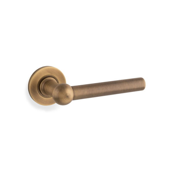Siskin door lever on rose - solid brass