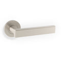 Jesper door lever on rose - solid brass
