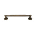 Bronze cabinet pull on a white background