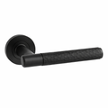 Black door handle with textured grip on a white background
