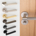 Spitfire REEDED door lever on rose - solid brass